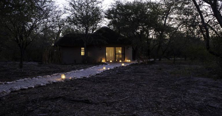 Etosha safari lodge – Honeymoon Bungalow in woodland