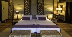 King-size bed in a Little Ongava villa