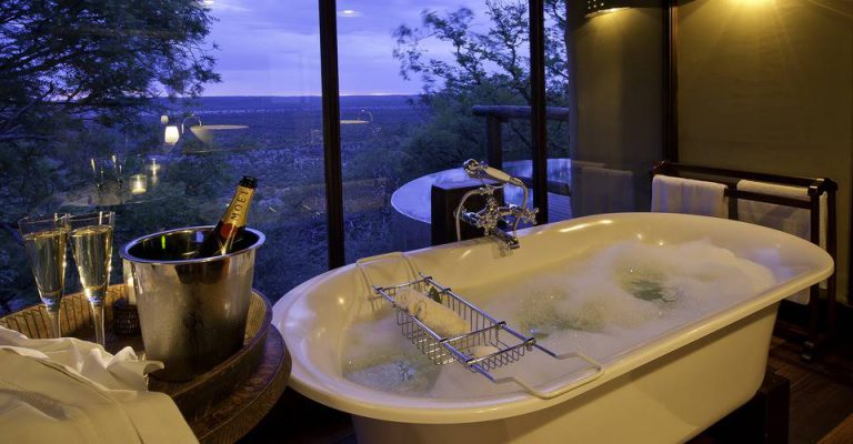 Bathtub with a view in a Little Ongava villa