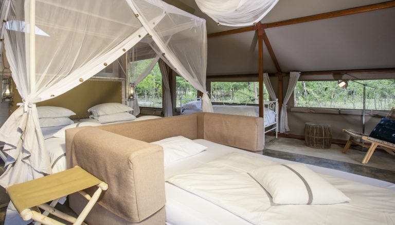 Sleeper couch and beds inside a Mushara family tent