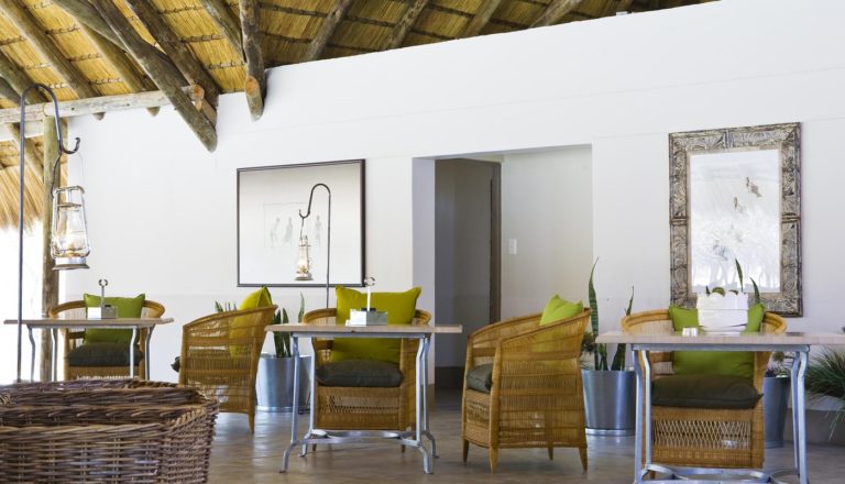 Indoor dining area at Mushara Bush Camp