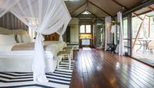 Open-plan luxury tent interior at Mushara Outpost