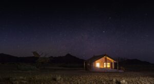self-catering accommodation near Sossusvlei – isolated chalet beneath a starry sky