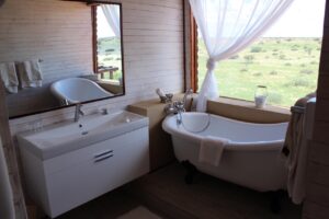 Kalahari Desert accommodation – bathroom with landscape view