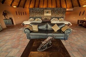 Namibia safari lodge – round thatched villa lounge