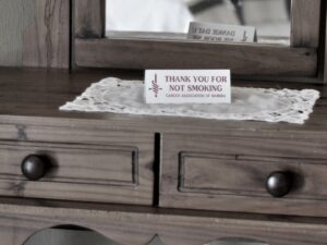 Obelix Guesthouse – non-smoking notice and dresser