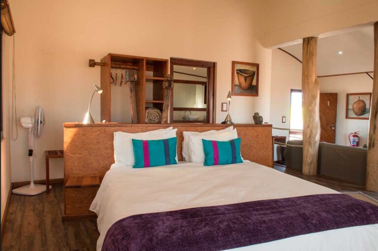 Desert Breeze accommodation – double bed and dresser