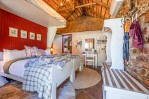 Stone-walled bedroom at Canyon Lodge near Fish River Canyon