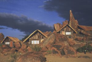 Canyon Lodge chalets illuminated among granite boulders