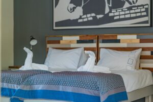 Damara Mopane Lodge chalet bedroom with reading lights