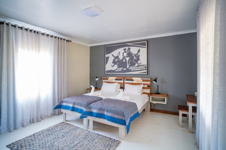 Twin chalet bedroom at Damara Mopane Lodge