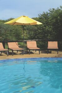 Poolside loungers at Etosha Safari Camp