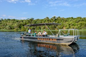 Hakusembe River Lodge safari boat on the Okavango River