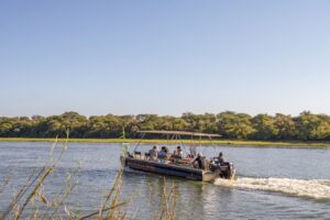 Guests cruising the Okavango River near Hakusembe
