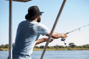 Casting a fishing line on the Okavango River