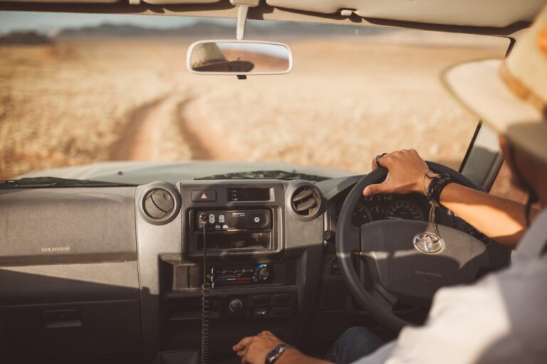 Guide driving a Namib Desert Lodge excursion