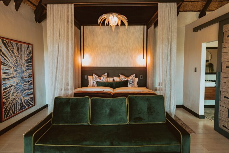 Double room with sofa at Namushasha River Lodge