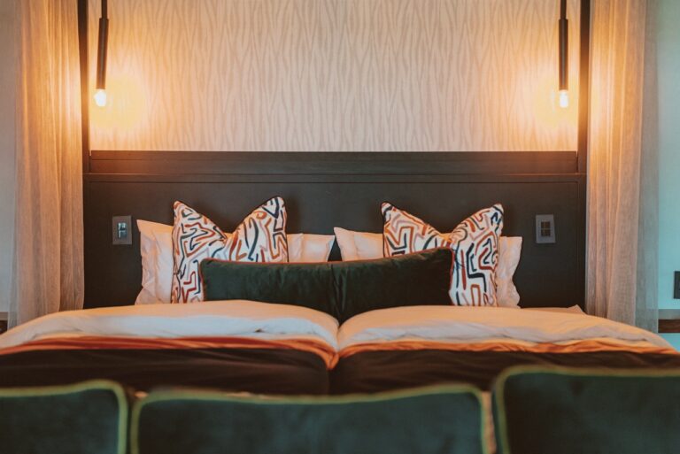 Double bed in a modern Namushasha River Lodge room