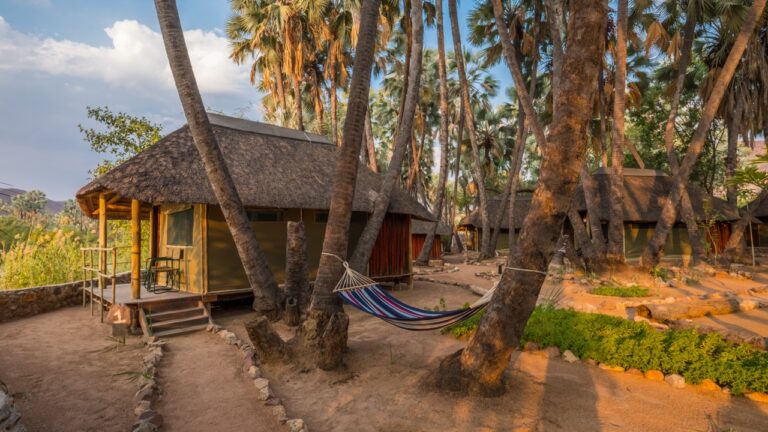 Riverside chalets at Omarunga Epupa-Falls Camp