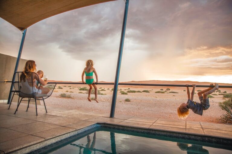 Guests beside a private plunge pool at The Desert Grace