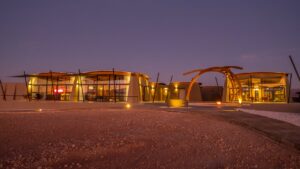 The Desert Grace lodge architecture at sunset