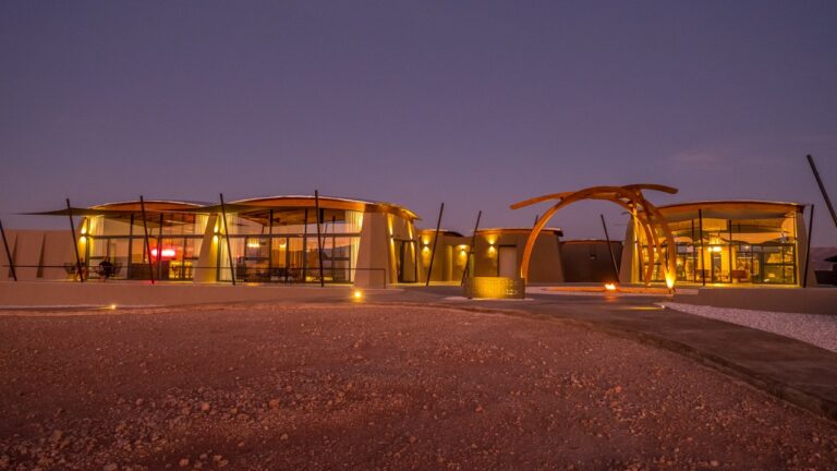 The Desert Grace lodge architecture at sunset