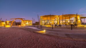 Wide exterior view of The Desert Grace lodge