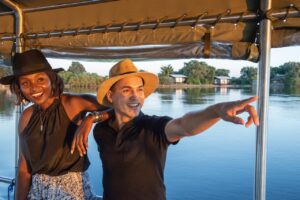 Guests on a Zambezi River boat cruise from Zambezi Mubala Camp