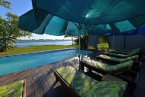 Swimming pool overlooking the Zambezi River at Zambezi Mubala Lodge